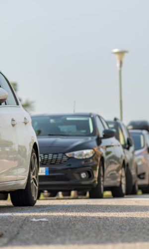 modern-cars-parked-on-city-street-side-in-resident-2022-01-21-23-13-37-utc (1)
